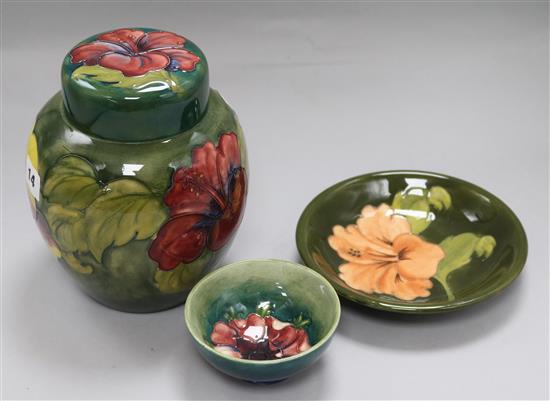 A Moorcroft Hibiscus jar and cover and a similar dish and bowl